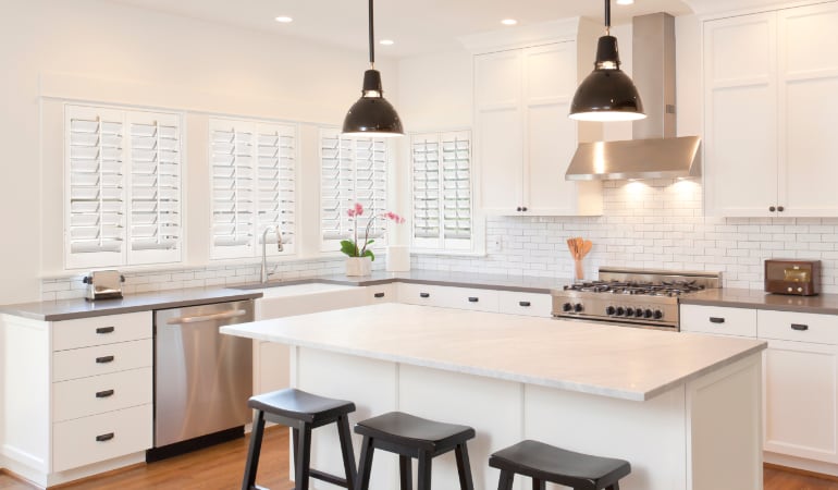 Plantation shutters in a bright Austin kitchen.